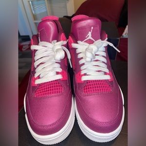 Jordan 4’s size 7Y fits 8.5 women. Worn only once or twice.